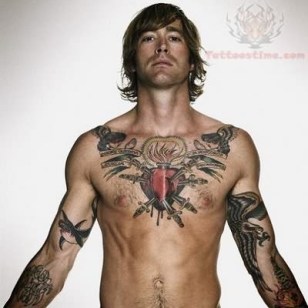 sacred-heart-tattoo-on-man-chest